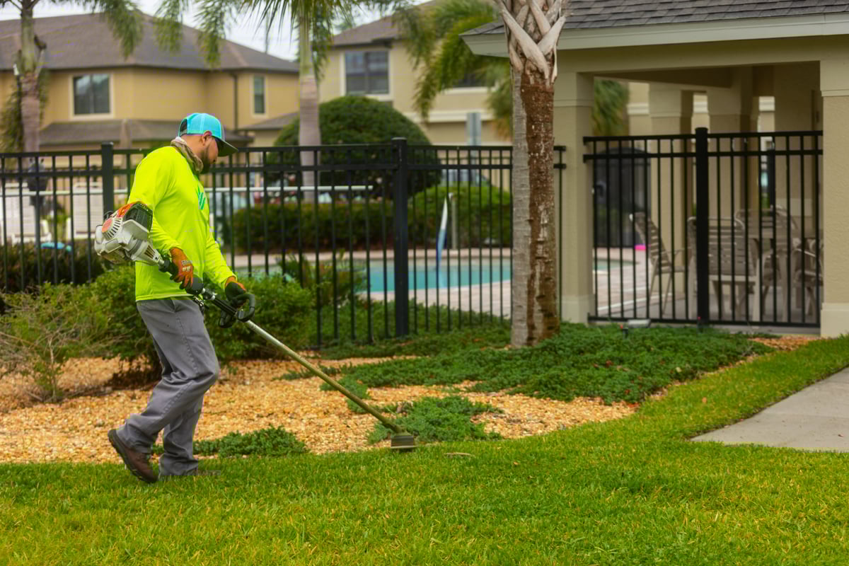 commercial maintenance crew community hoa line trime edging bed line grass