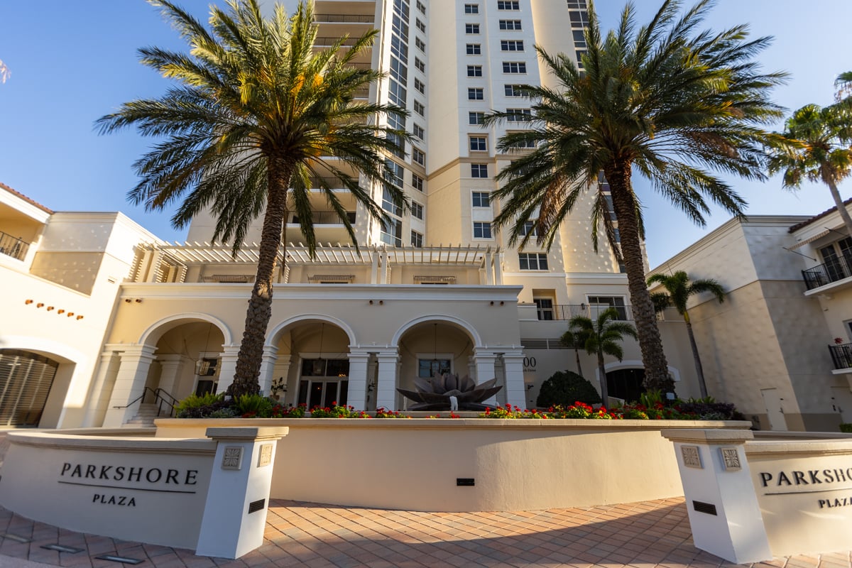 community hoa high rise condo commercial  entrance palm trees pavers plaza