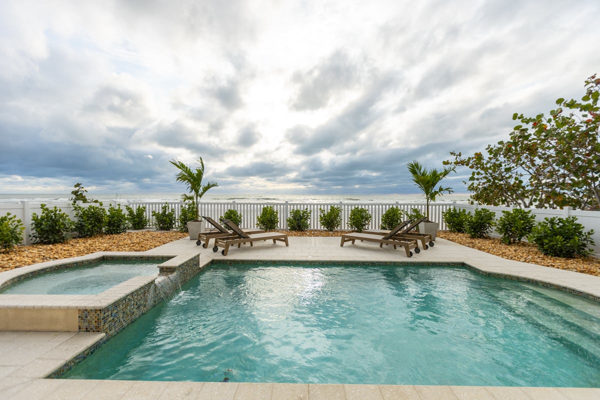 pool water landscape plant bed water feature tile fence