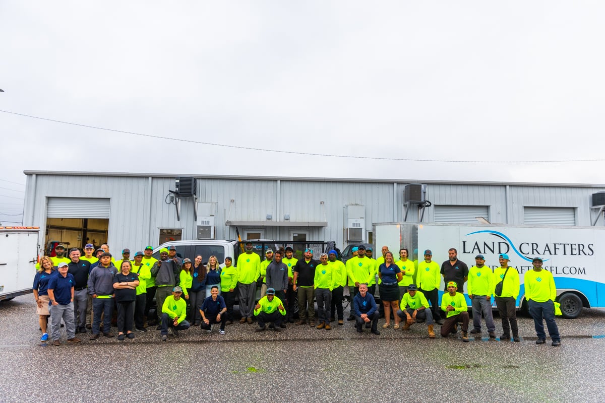 team photo crew truck trailer shop landcrafters