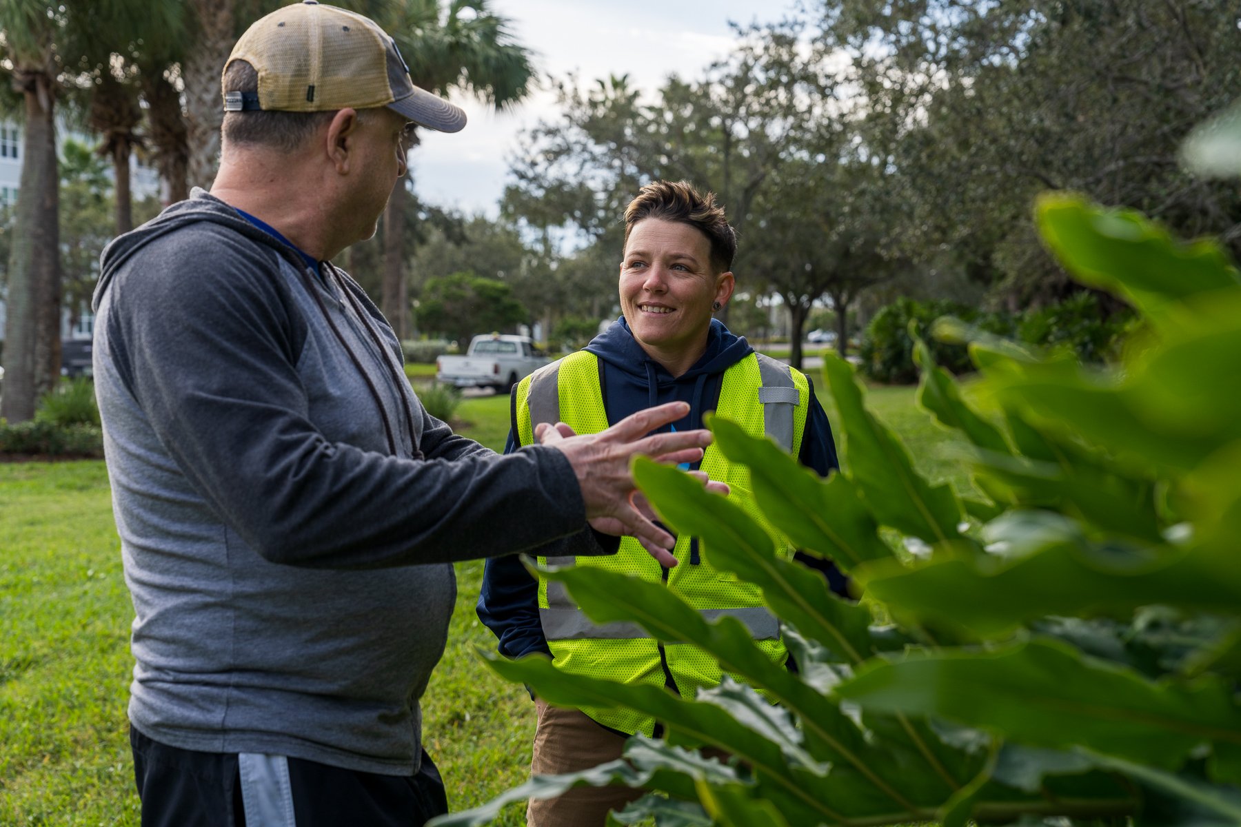 Account manager walking with HOA board member around property 3