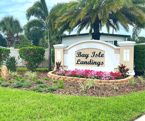 Community entrance with annual flowers planted