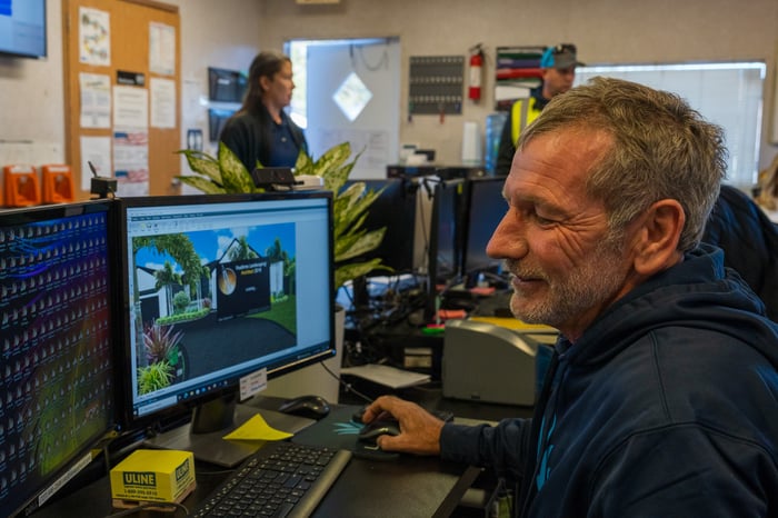 landscape designer looking at computer