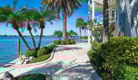 residential landscape mainteance garden beds along water 1