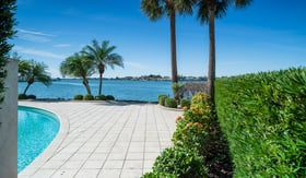 residential landscape mainteance garden beds near water 1