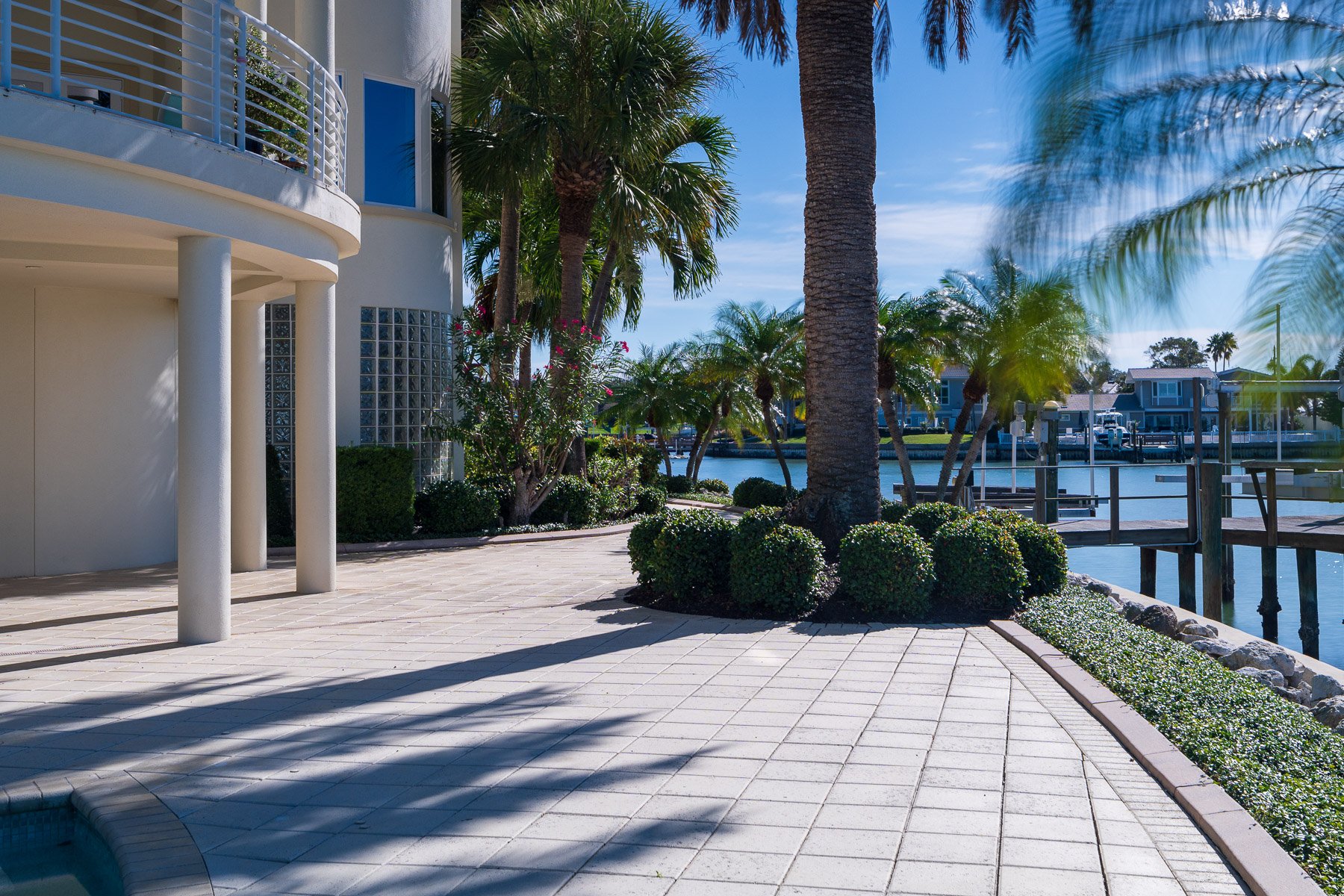 residential landscape mainteance garden beds near water 3
