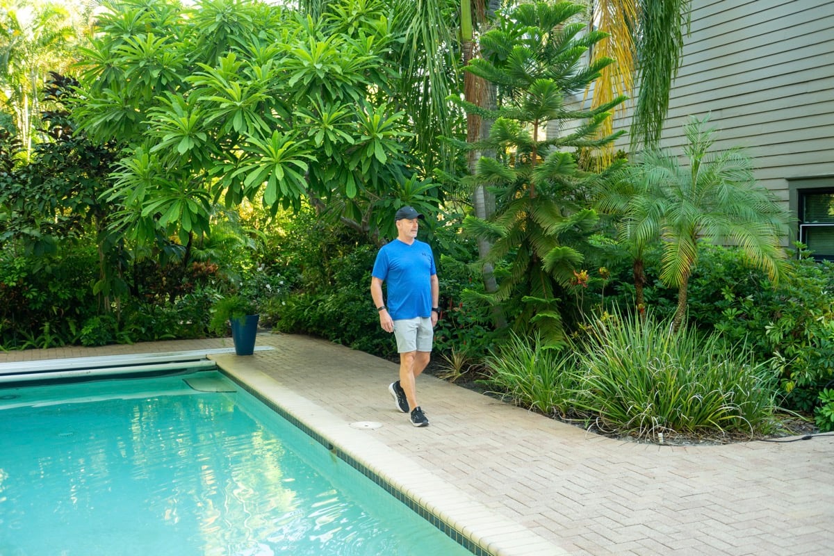 Residential landscape homewoner looking at landscape beds 5