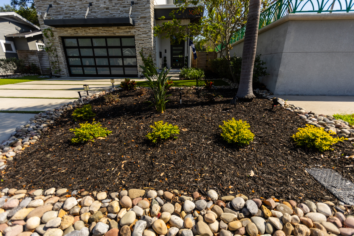mulch and landscape bed next to driveway