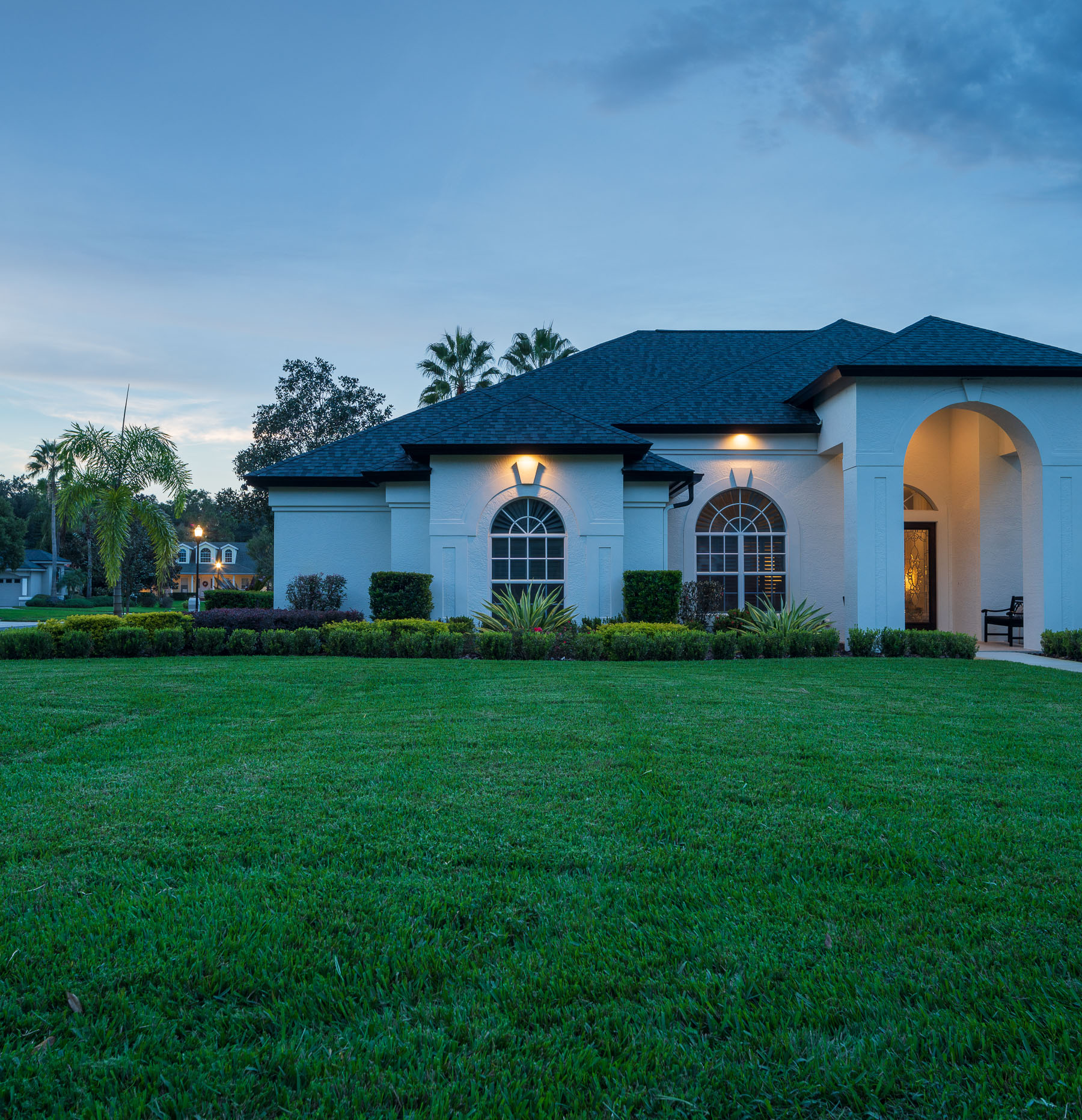 residential landscape maintenance front yard with garden beds