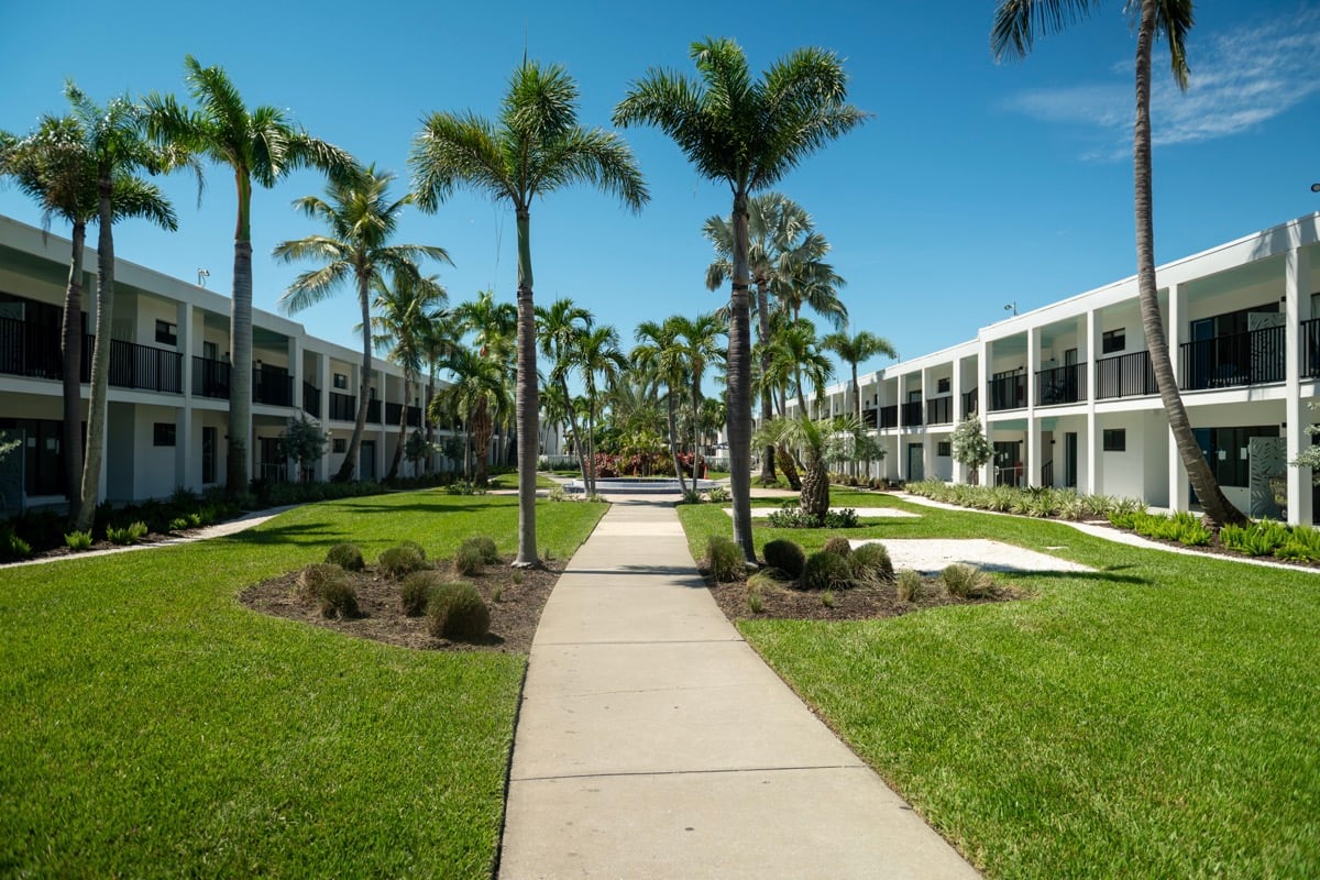 commercial property green lawn landscape beds paths 2